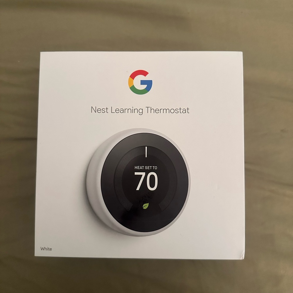 Google Nest Thermostat - Sleek White Design